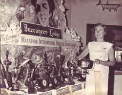 Marge Street, pictured here with the trophy table in 1967 at the Buccaneer Lodge, today site of Tranquility Bay Resort, is one of the MIBT founders.